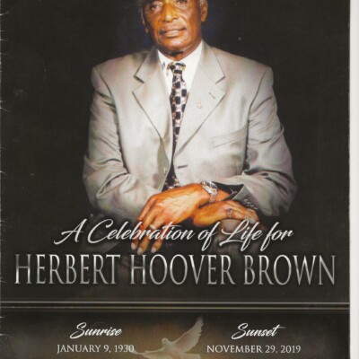 A memorial program cover featuring an older man in a suit, hands folded, with the text A Celebration of Life for Herbert Hoover Brown, a dedicated veteran, Sunrise January 9, 1930 – Sunset November 29, 2019, and an image of a dove. A memorial program cover featuring an older man in a suit, hands folded, with the text A Celebration of Life for Herbert Hoover Brown, a dedicated veteran, Sunrise January 9, 1930 – Sunset November 29, 2019, and an image of a dove.
